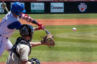 Brodie Merrill takes a swing for the Panthers. (Photo by Alden Davis / 228 Sports)