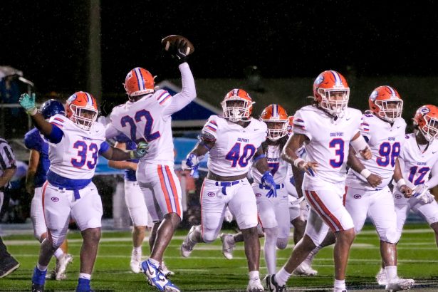 Gulfport's defense celebrates during the 35-0 shutout. (Photo by James Spain / 228 Sports Student Photographer)